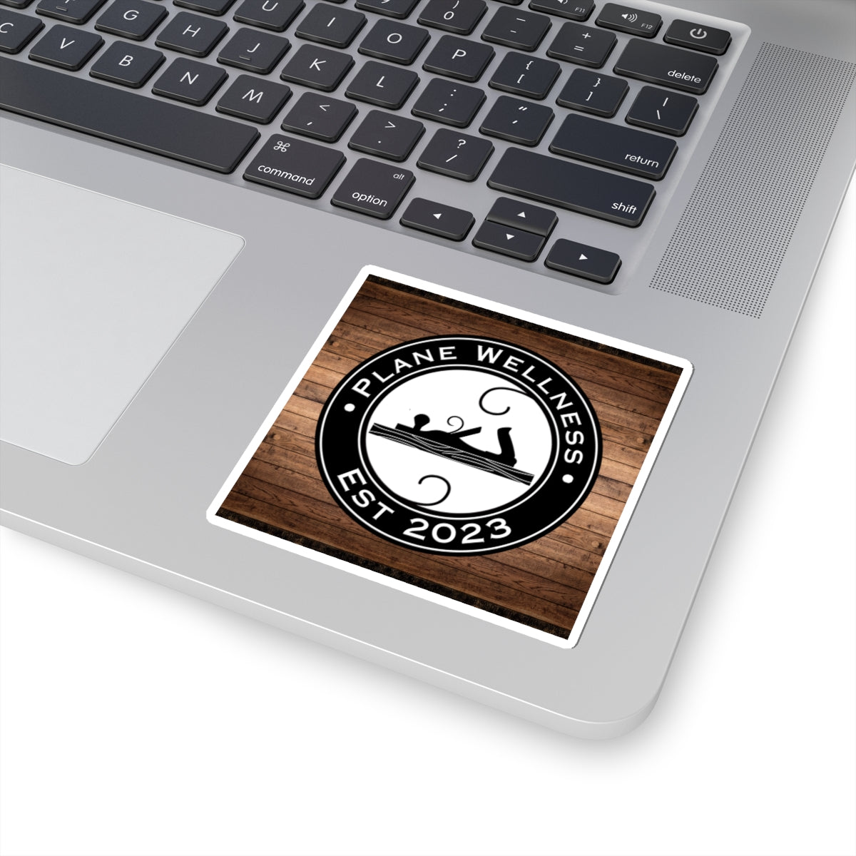 Plane Wellness Sticker w/ Wood Background