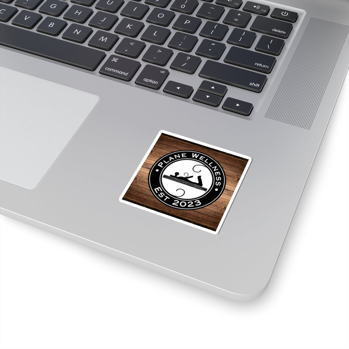 Plane Wellness Sticker w/ Wood Background